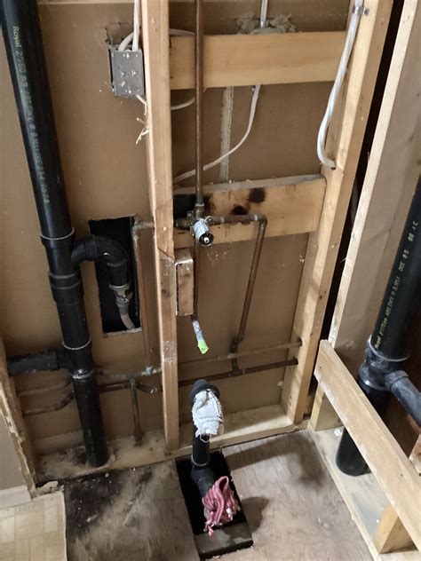 electrical box behind shower wall